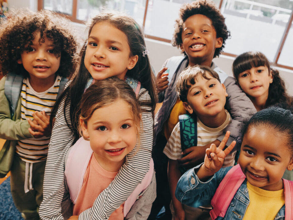 Class selfie in an elementary school. Kids taking a picture together in a co ed school